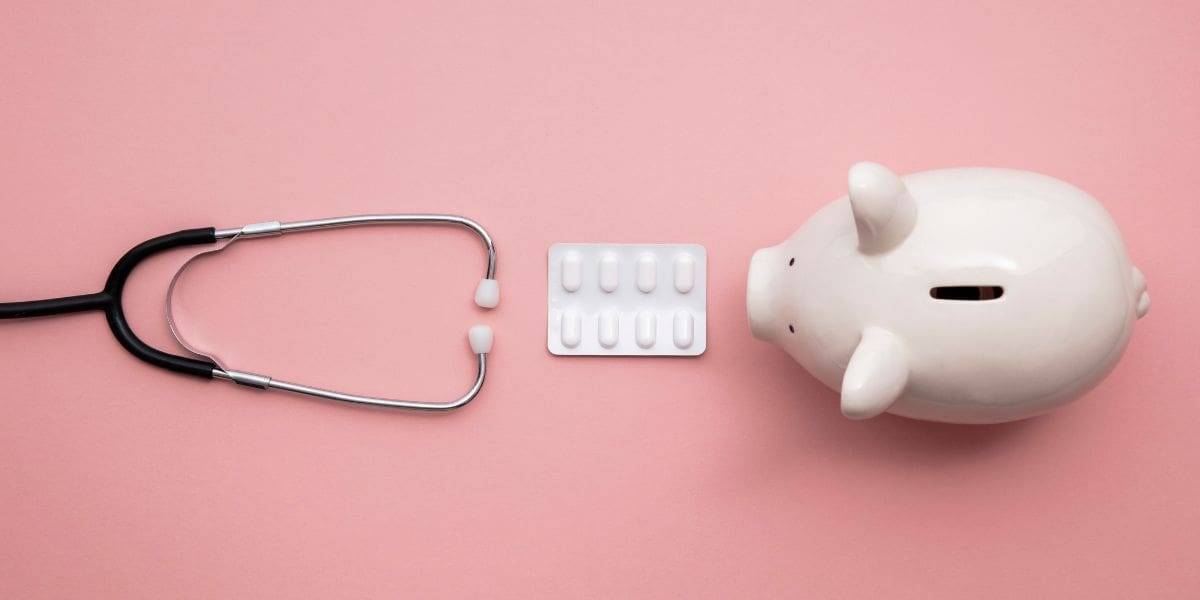 Stethoscope, medication blister pack, and piggy bank symbolising ways to reduce private ADHD assessment costs in the UK