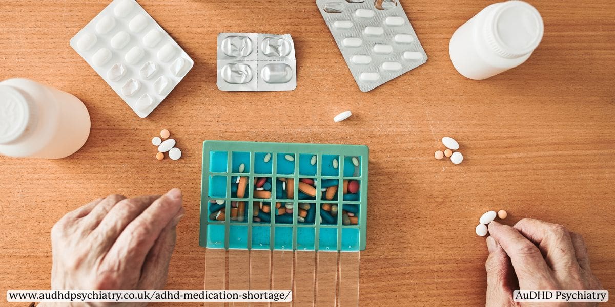 Hands organizing ADHD medication in a weekly pill box, showing how UK patients can manage disrupted schedules during the medication shortage.