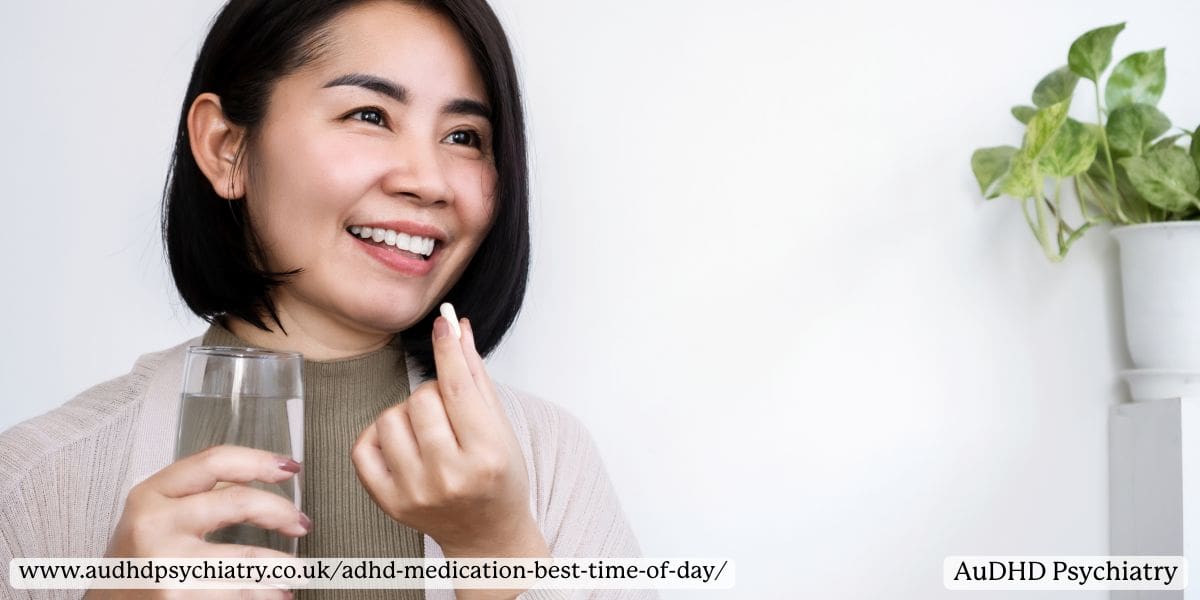 Smiling adult woman holding a pill and a glass of water, representing ADHD medication timing for adults