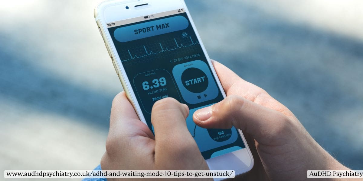Close-up of hands using a smartphone app with timers and visual data, representing ADHD-friendly tech tools to manage waiting mode and productivity.