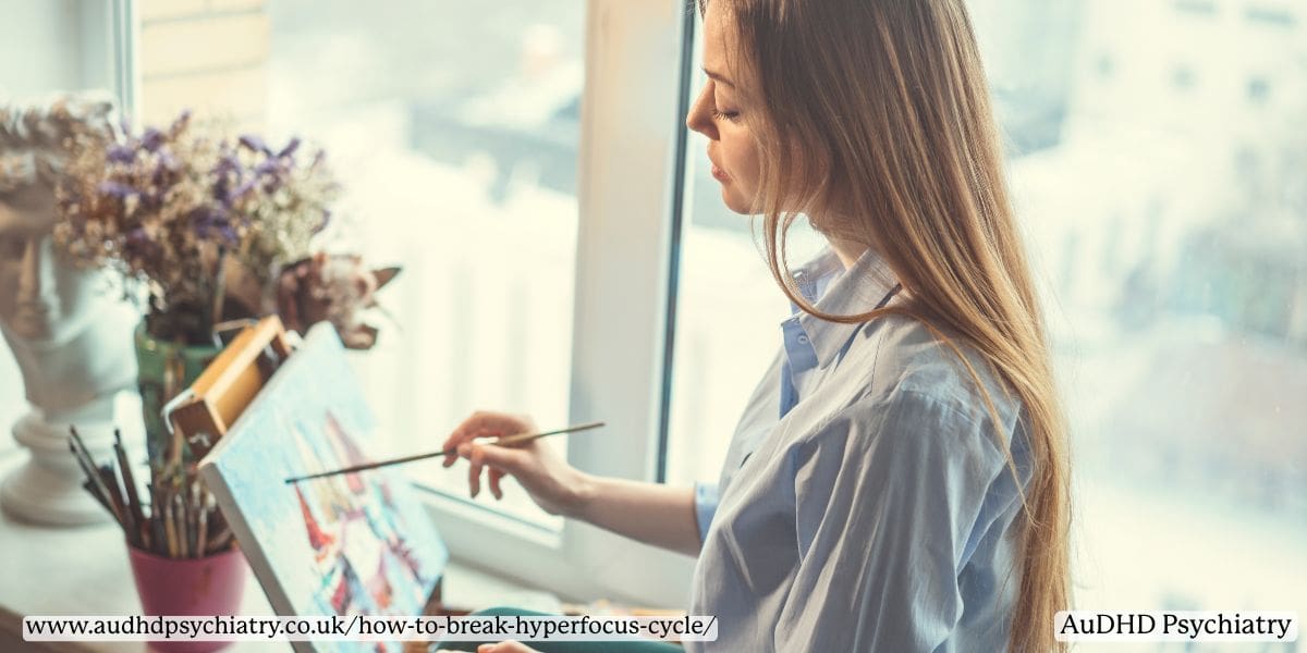Woman deeply engaged in painting, showing how ADHD brains hyperfocus on stimulating tasks.