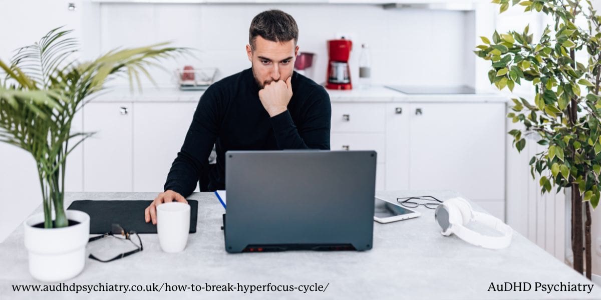 Focused man writing at a desk, illustrating the double-edged nature of ADHD hyperfocus.