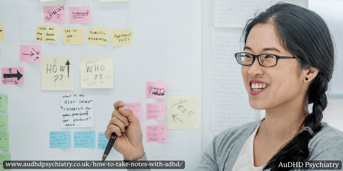 Student using colourful sticky notes – visual note-taking technique for ADHD organisation.