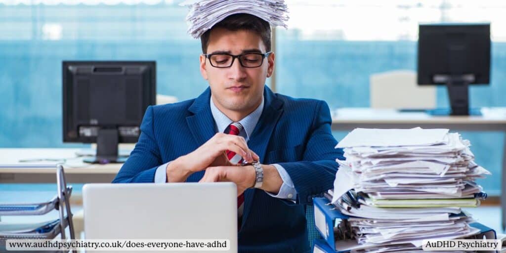 Stressed office worker with paperwork illustrating work struggles due to unregulated ADHD