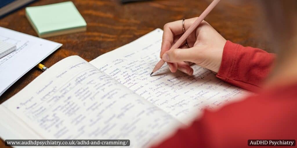Close-up of handwritten notes and pencil – ADHD and cramming study preparation