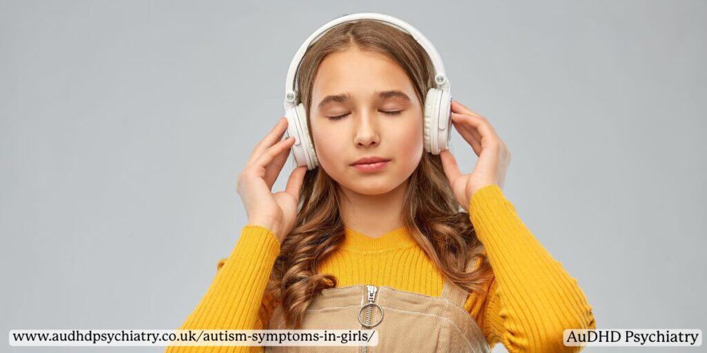 Girl listening to music with headphones – sensory sensitivity in autism symptoms in girls