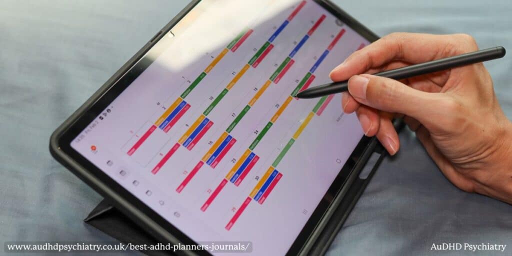 Tablet showing a digital ADHD calendar with color-coded events.