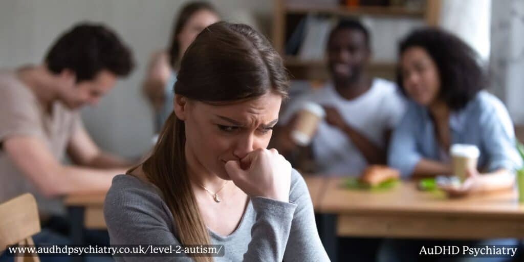 Woman feeling anxious in café – social challenges experienced by people with autism