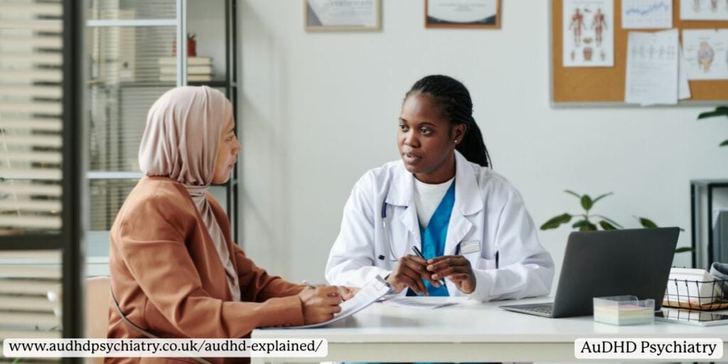 Clinician discussing diagnosis with adult woman – professional assessment for AuDHD