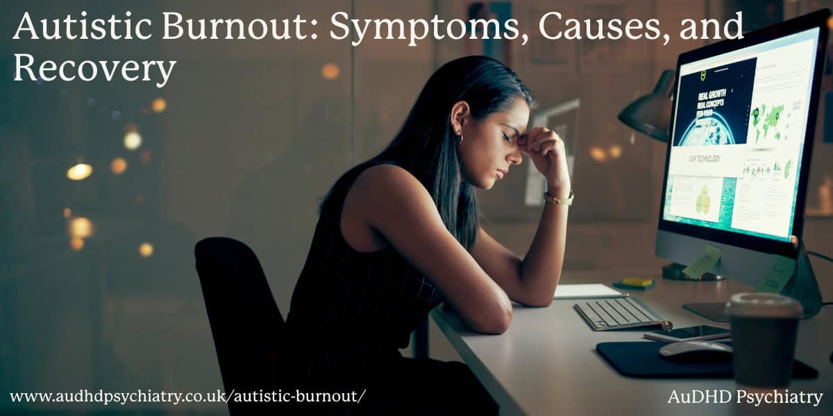 Woman sitting at desk feeling exhausted – autistic burnout symptoms and recovery