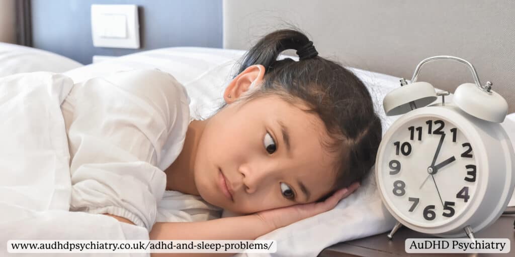 Child lying awake next to a clock, highlighting how ADHD and sleep problems can affect children