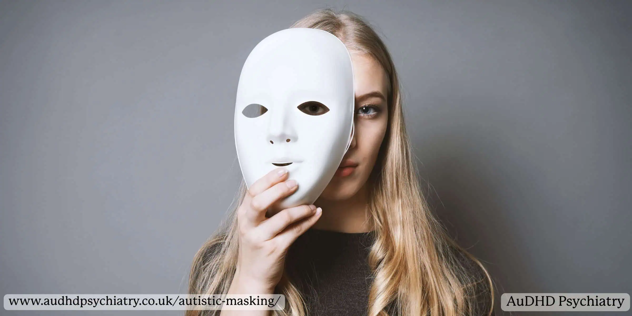Woman holding a white mask representing autistic masking and hiding autistic traits